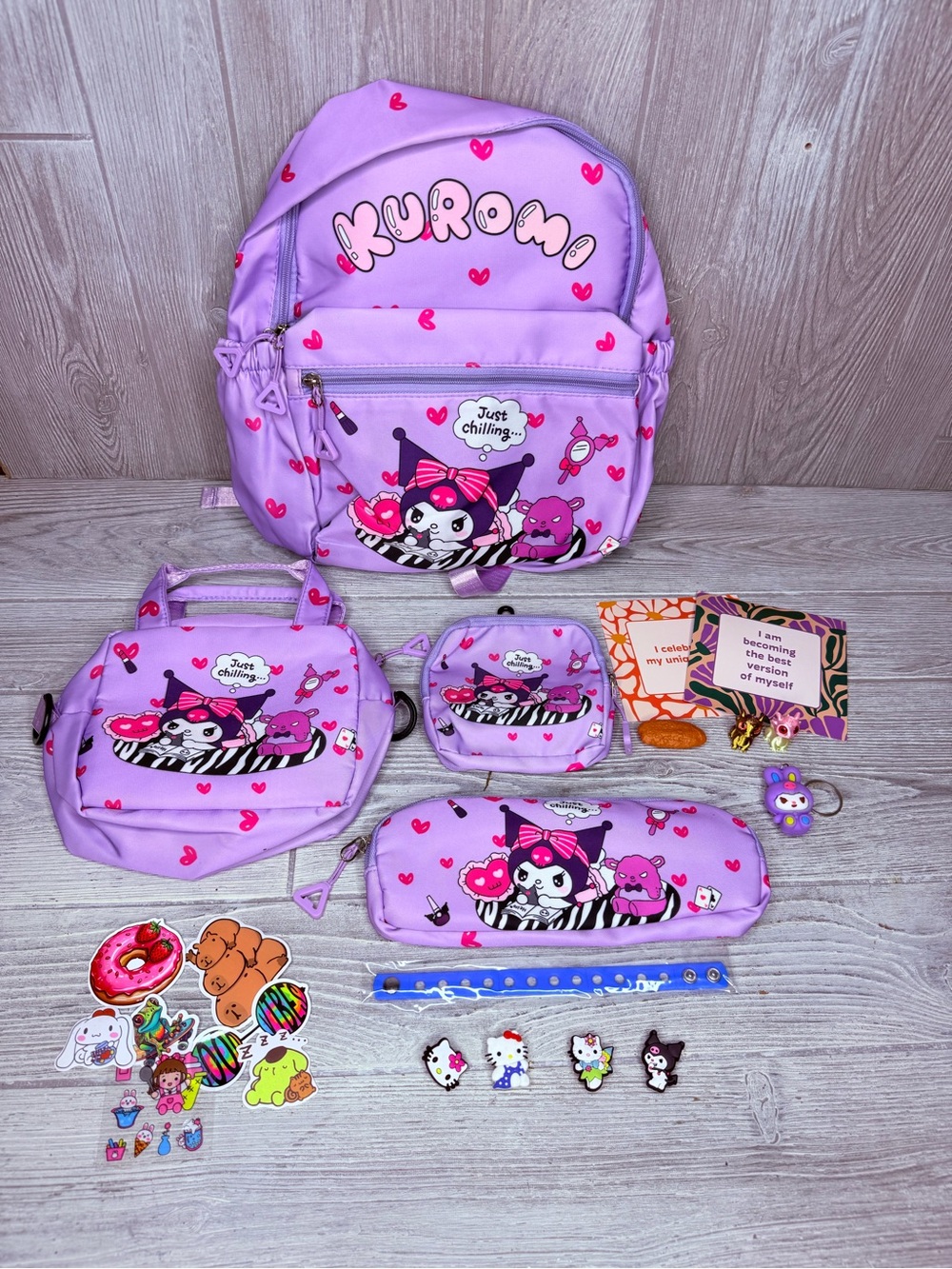Kuromi backpack bundle , croc charms , keychain , stickers , pen , dragons bags